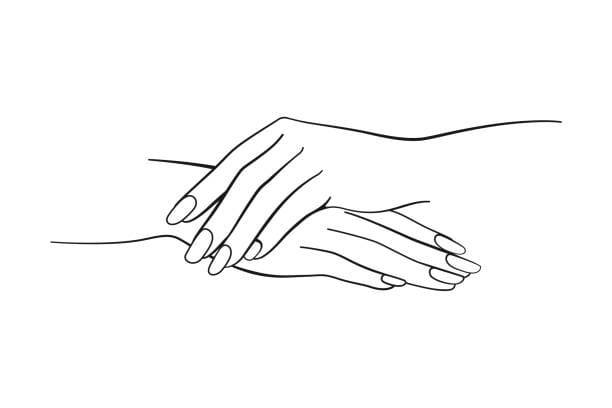 Woman receiving a professional manicure at a luxury nail salon